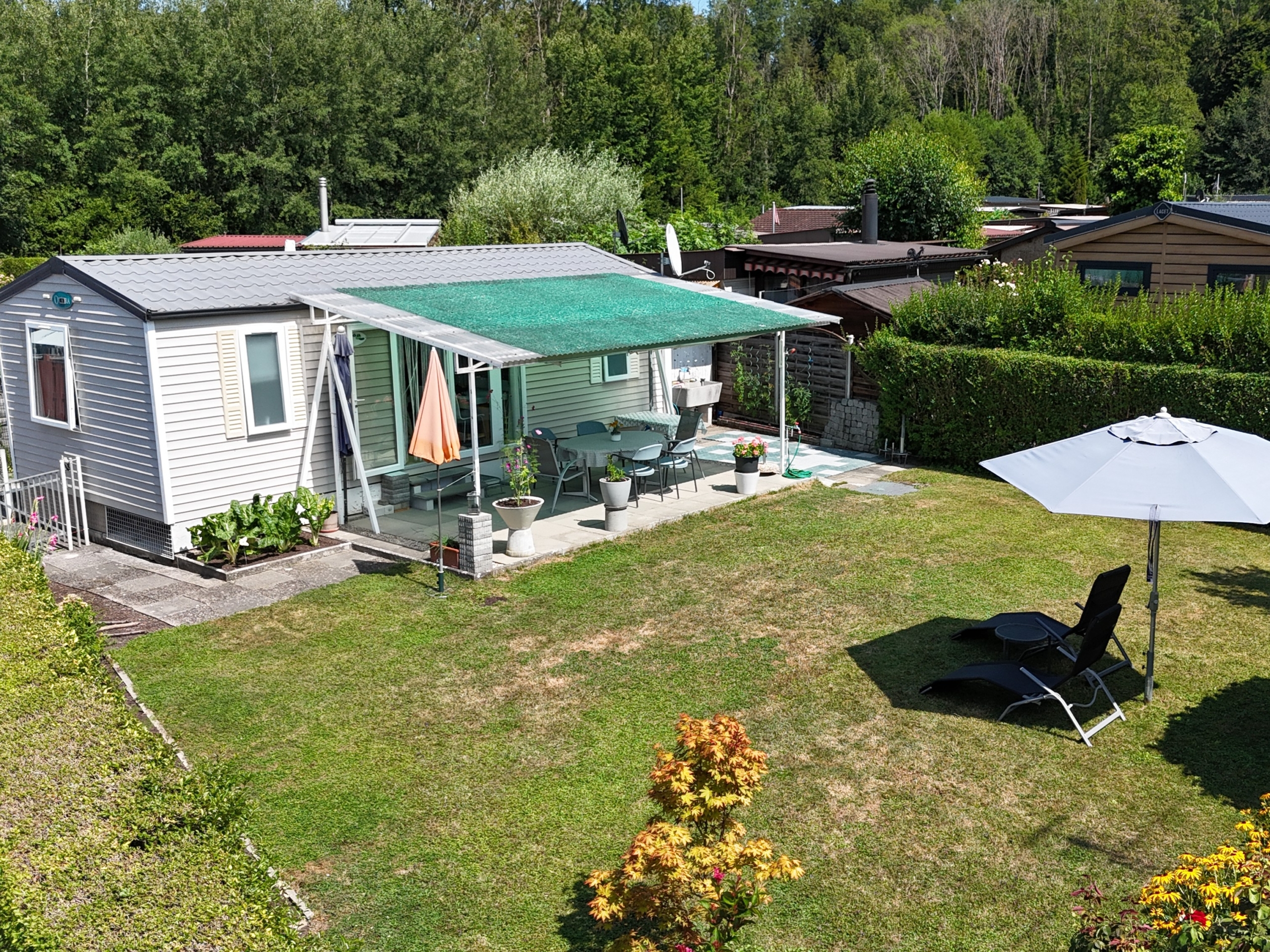 Mobile-home de 3,5 pièces avec terrain en pleine propriété à proximité du lac